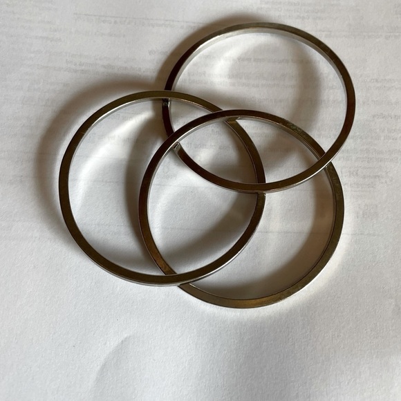Jewelry - Bracelet is three intertwined bracelets